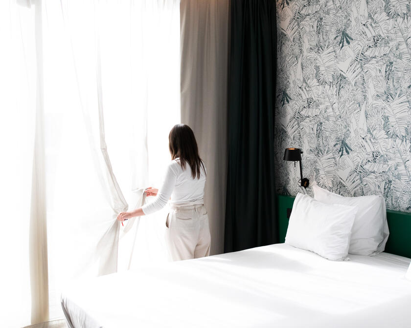 Pase la noche en una habitación de hotel en Gante