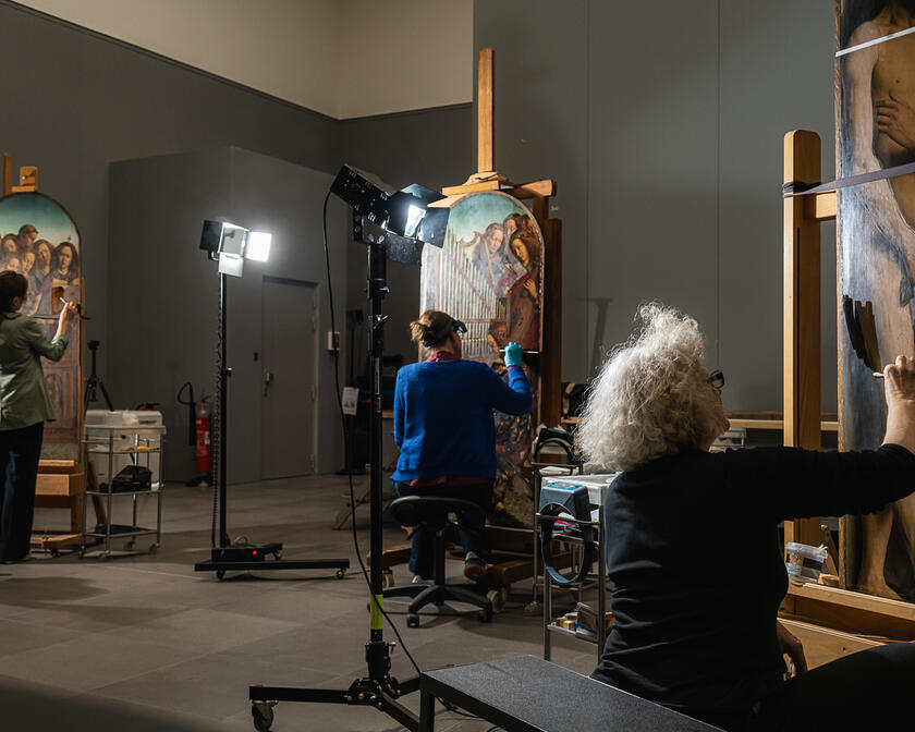 El taller de restauración en el MSK durante la tercera fase de la restauración del retablo del Cordero Mistico