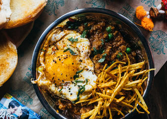 Dish with egg, meat and bread